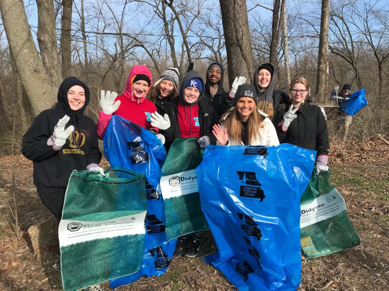 Brittani Cleaning Up the Local River Banks With Her Students