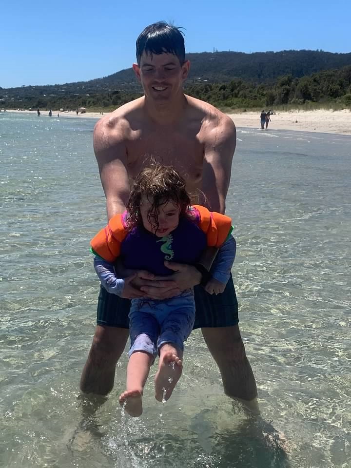 Sean & Our Niece at a Beach in Australia