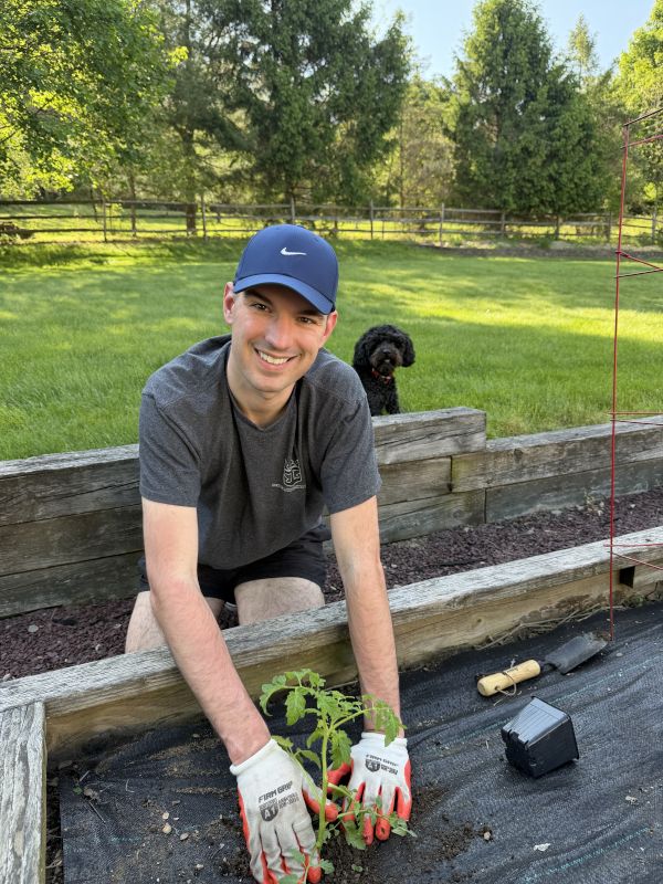 Paul Planting in Our Garden