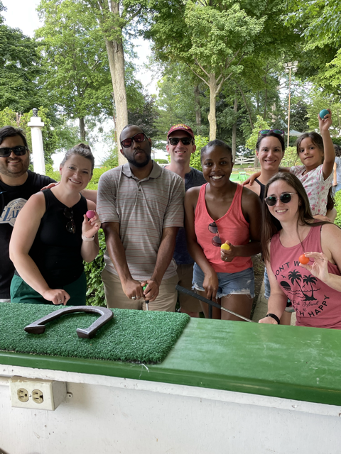 Playing Mini Golf with Friends