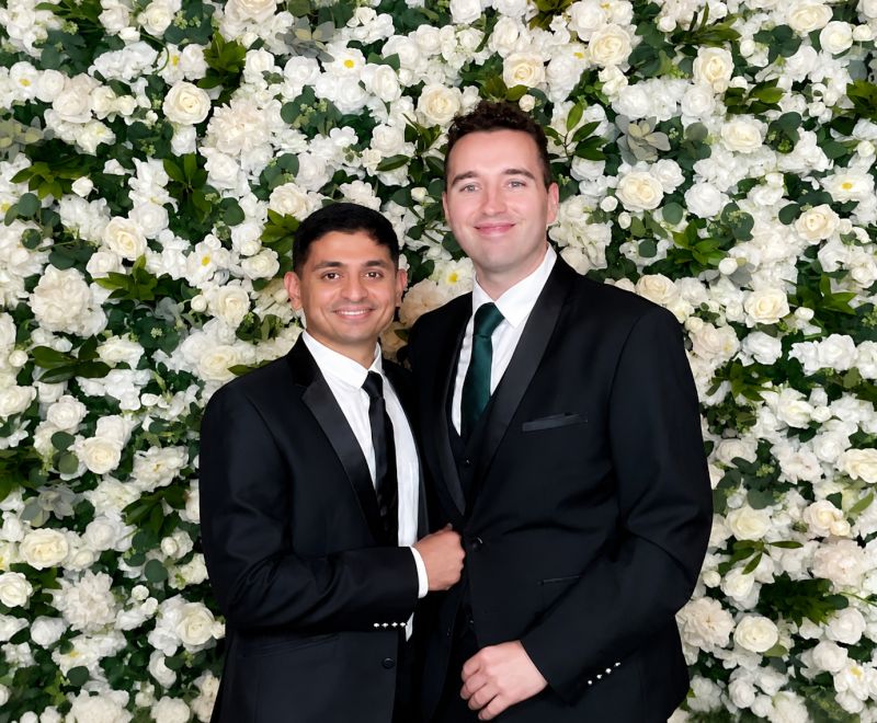 In Front of a Flower Wall