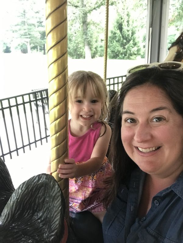 Fun on the carousel at the local park