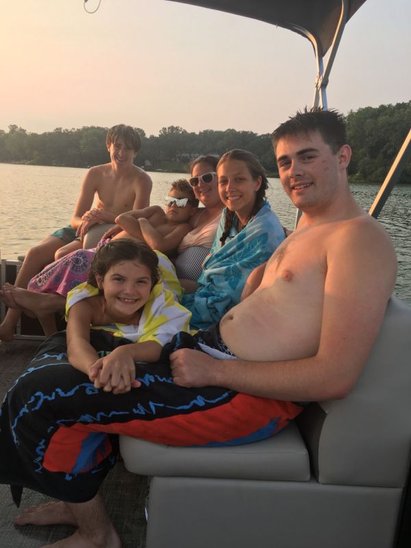 Megan living the lake life with her cousins, niece & nephew