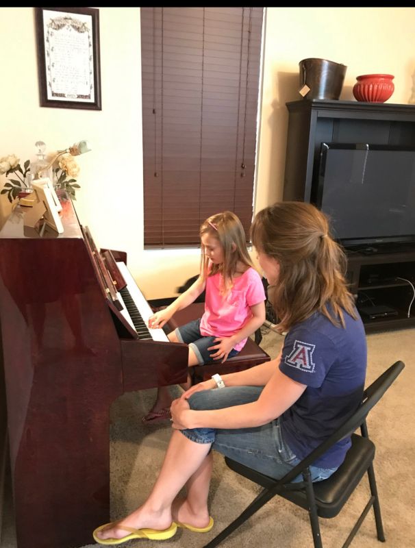 Erin Teaching Piano Lessons