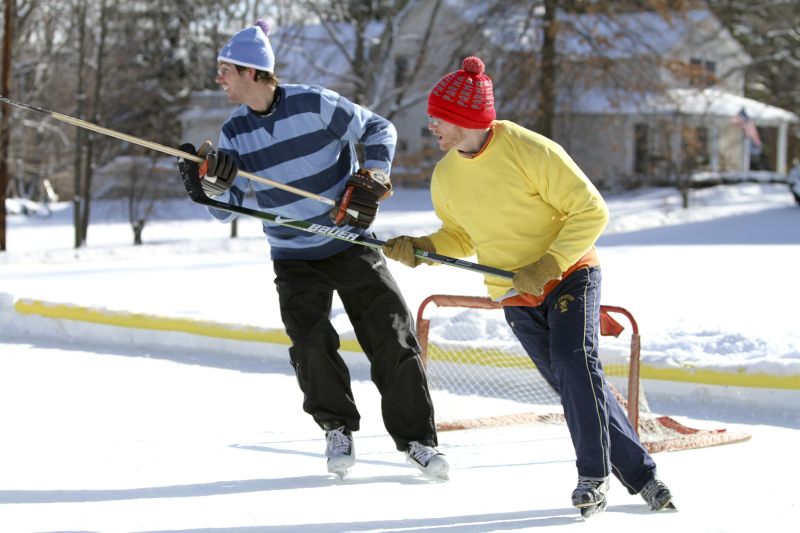 Drew & a Friend Playing Pond Hockey