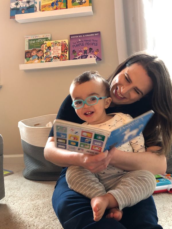 All Smiles Reading in Robbie's Room