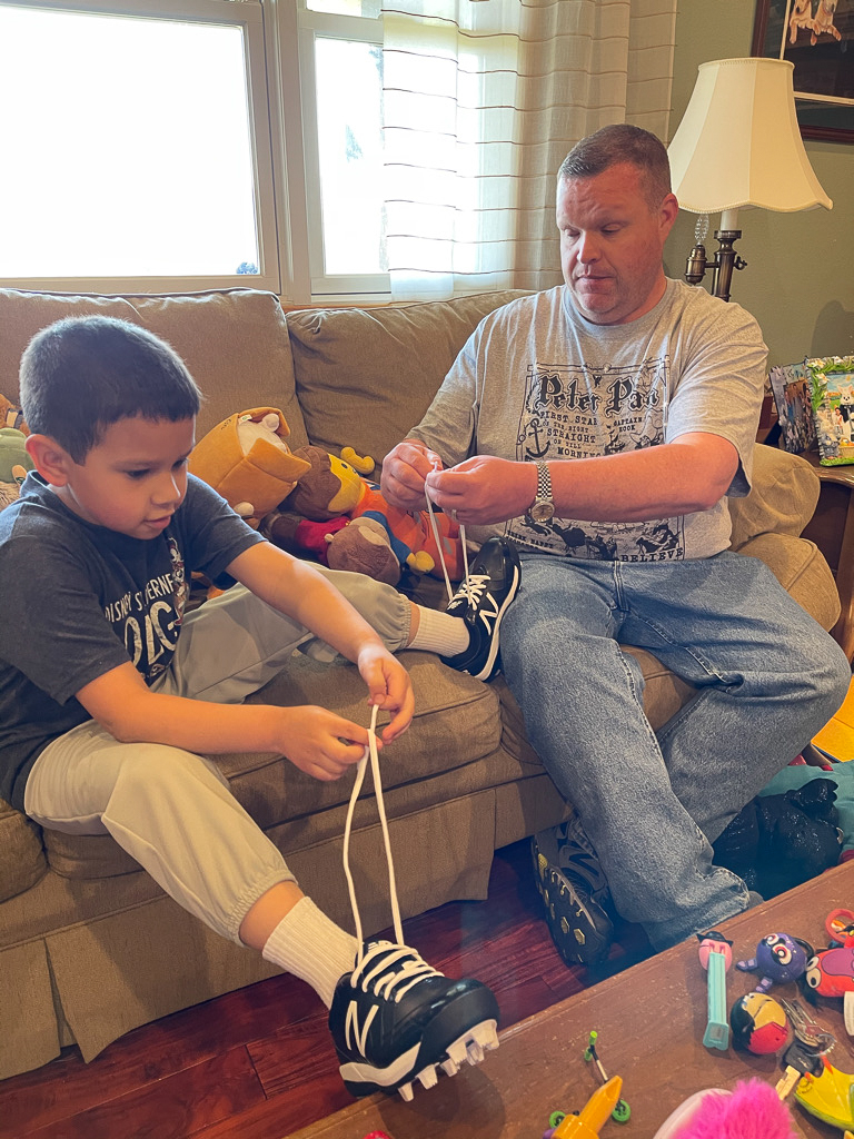 Learning to Tie His Shoes